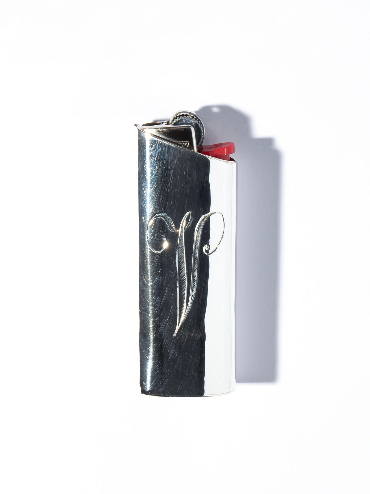 Monogram Lighter Case Small Size — back view showing polished silver finish