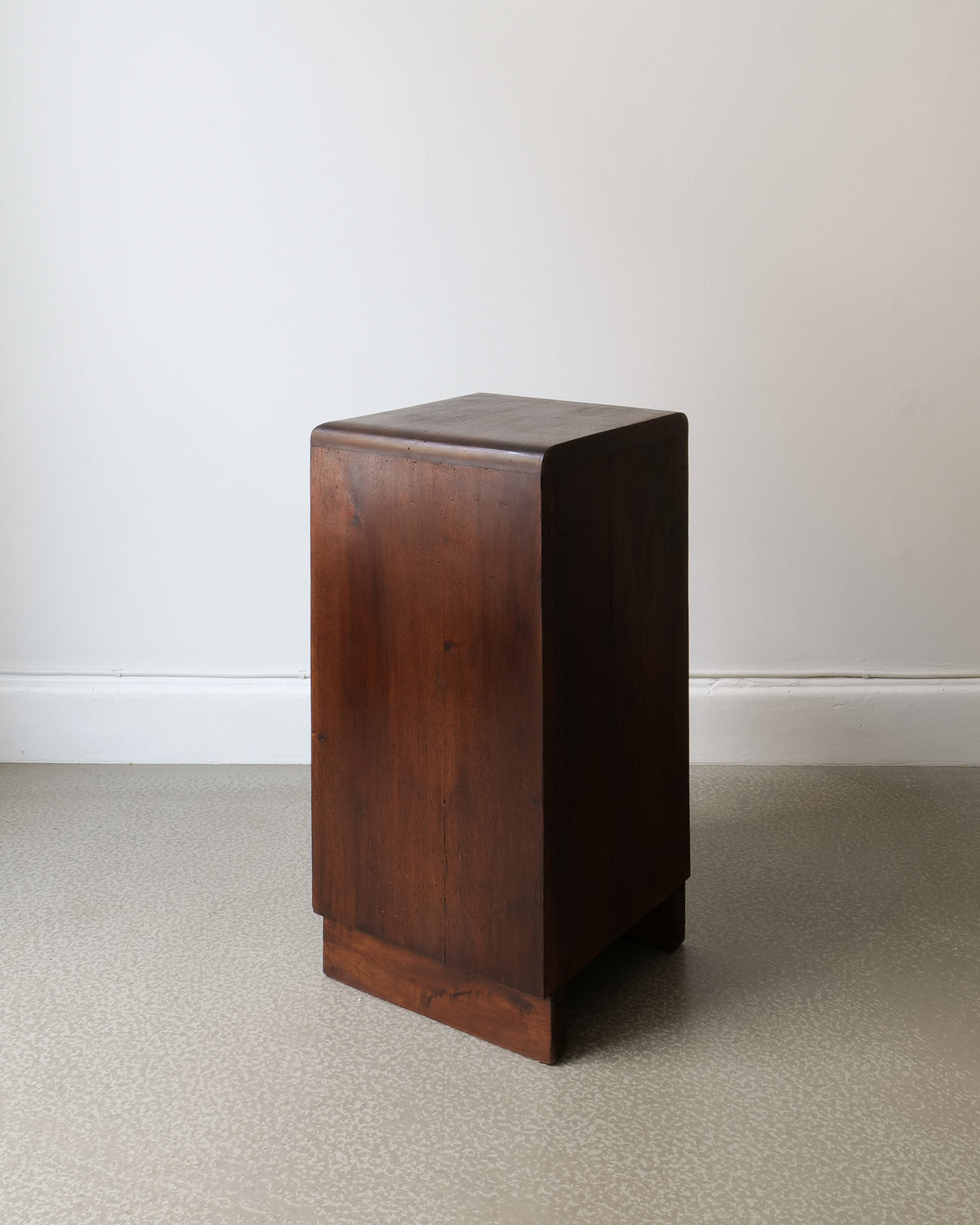 Art Deco walnut side table showing rectangular form and rich wood grain