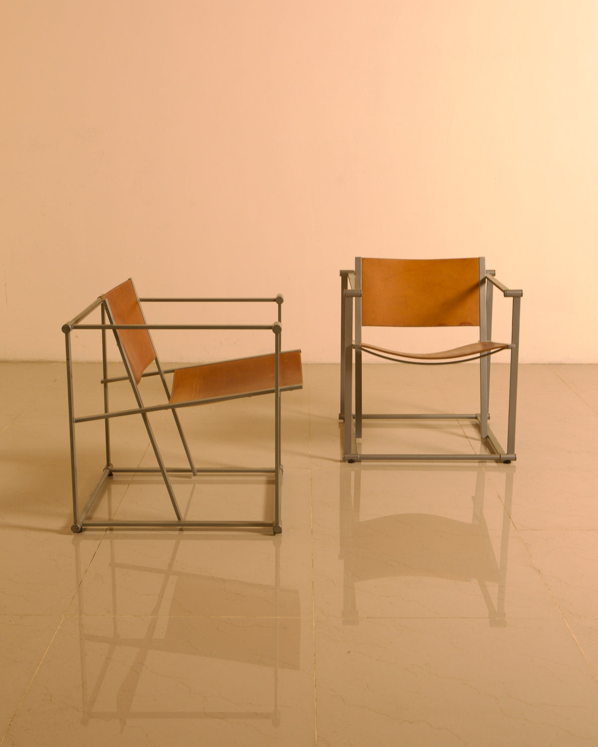 Pair of FM62 Armchairs by Radboud van Beekum for Pastoe, 1980s | The Oblist — metal frame, tan leather