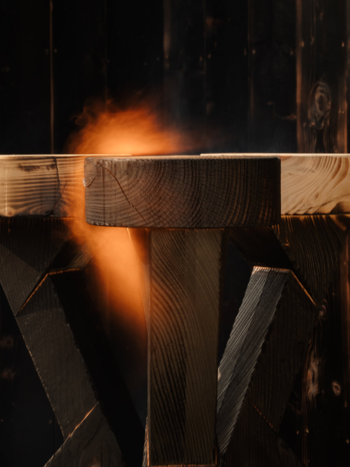 ABORA burnt wood end table detail showing flame treatment effect