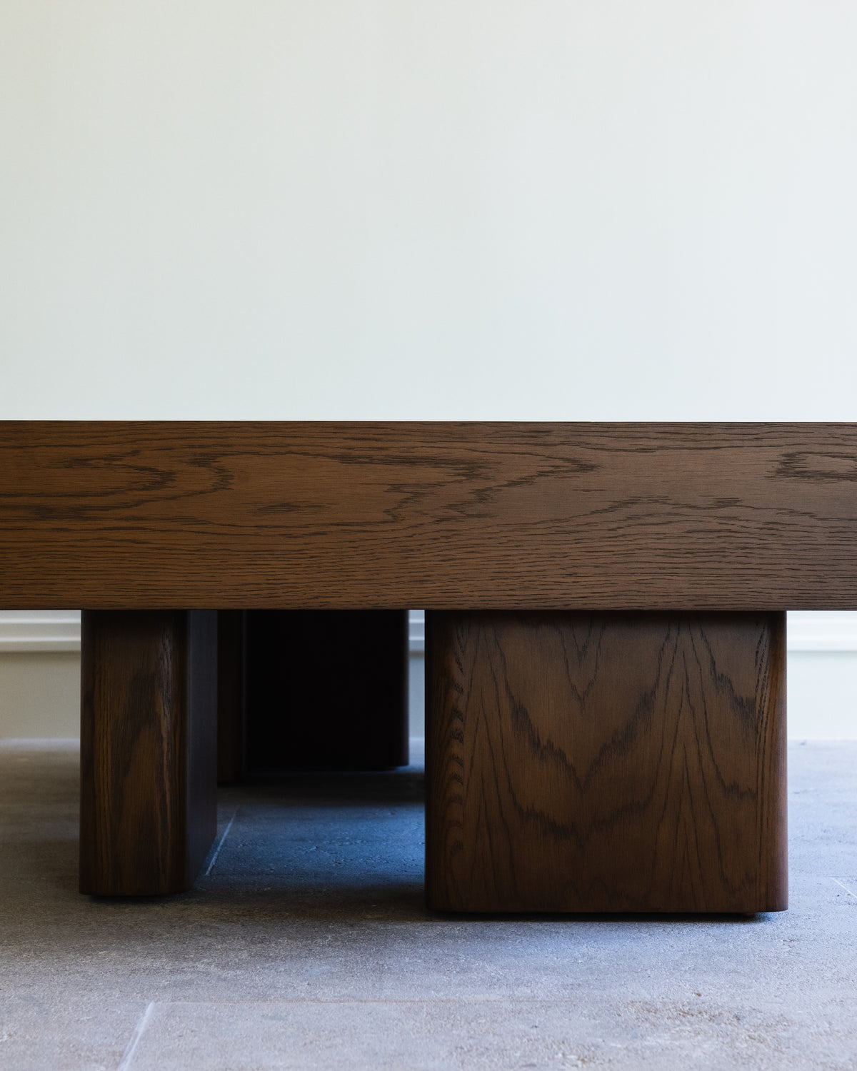 Chalette coffee table by Studio OSKLO showing geometric wood base