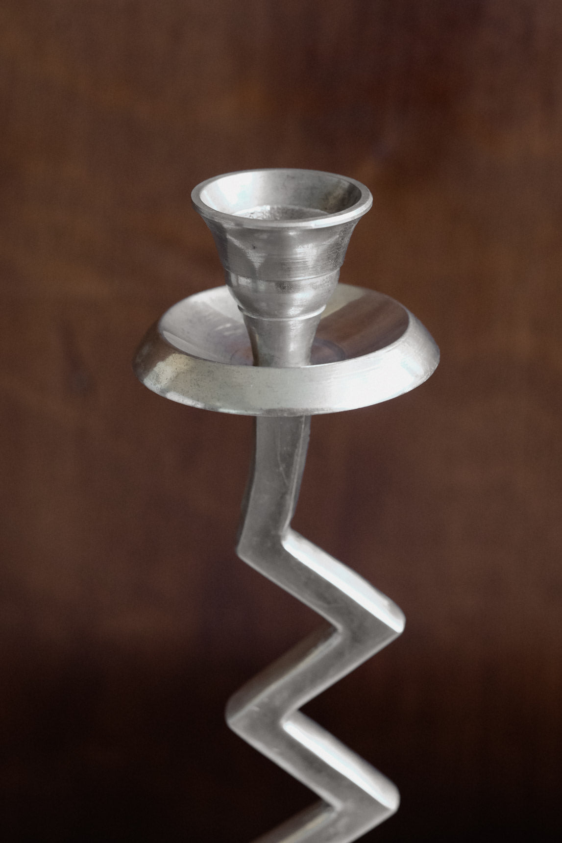 Zigzag Candleholder — close-up of silver metal design