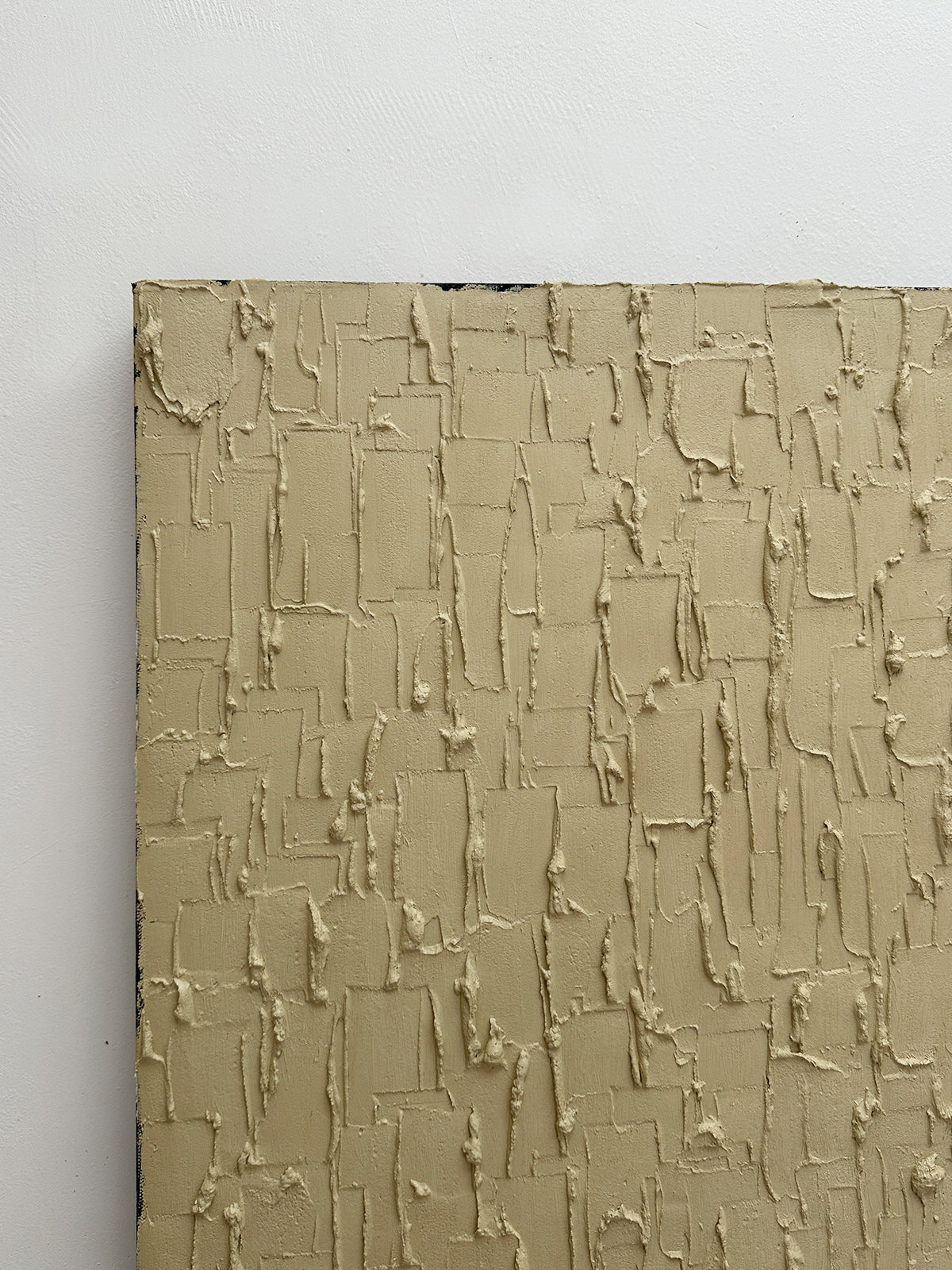 Buff titanium textured painting close-up detail view