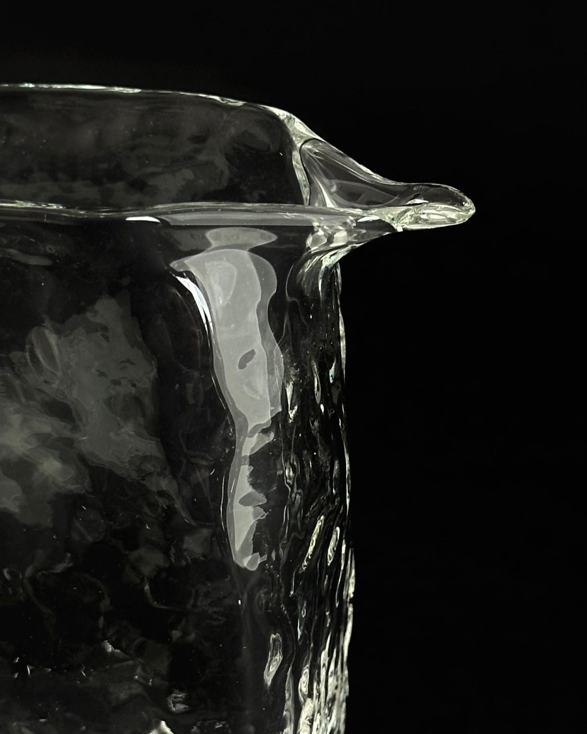 'DELIRIUM' small glass pitcher — side angle