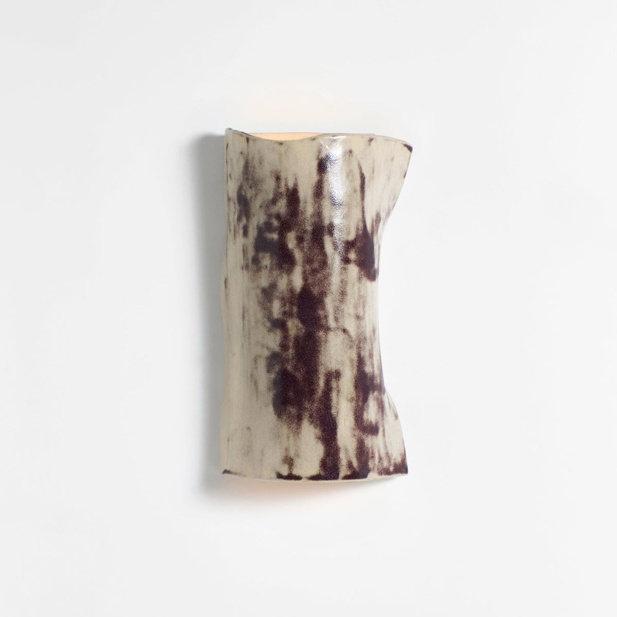 Papel Wall Light (large) — side view highlighting textured ceramic finish
