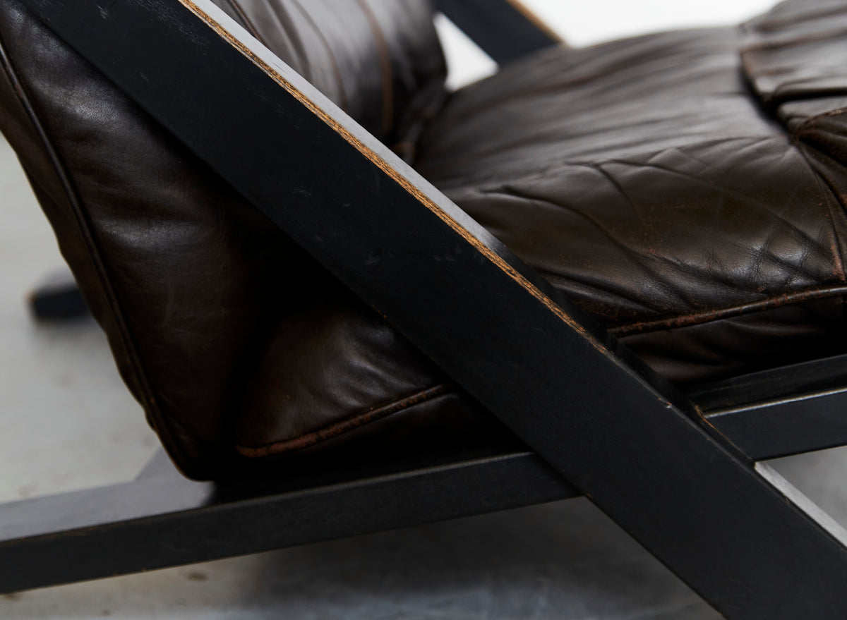 Close-up detail of DS80 lounge chair's black leather upholstery