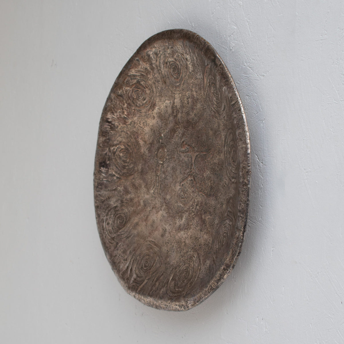 Bragalini Wall Art with Spiral Relief Motif in Hammered Metal — side angle