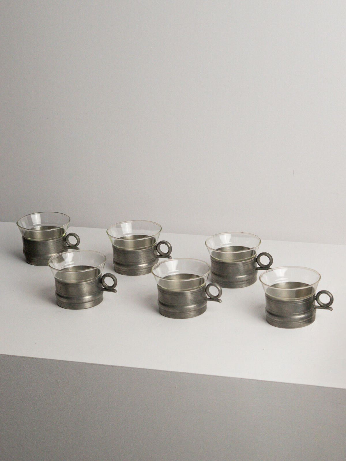 Set of Six Scandia Tenn Pewter Tea Glass Holders with Pressed Glass Inserts, Karlshamn, Sweden, 1977 by Studio Ecubed