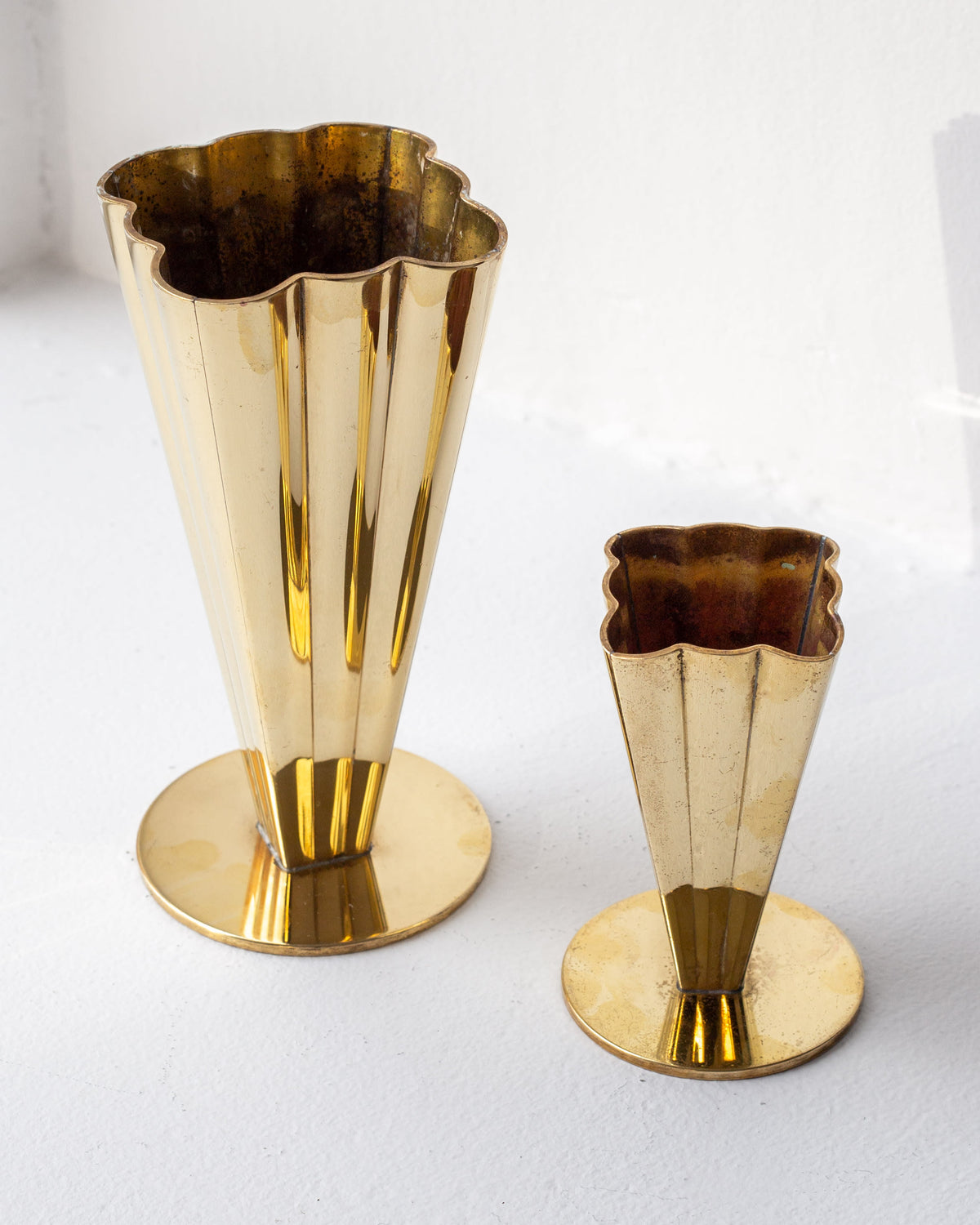 Pair of golden brass fluted vases with scalloped rims, 1950s