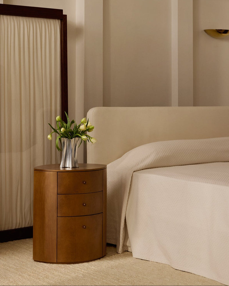 Observer warm brown birch nightstand in modern bedroom setting