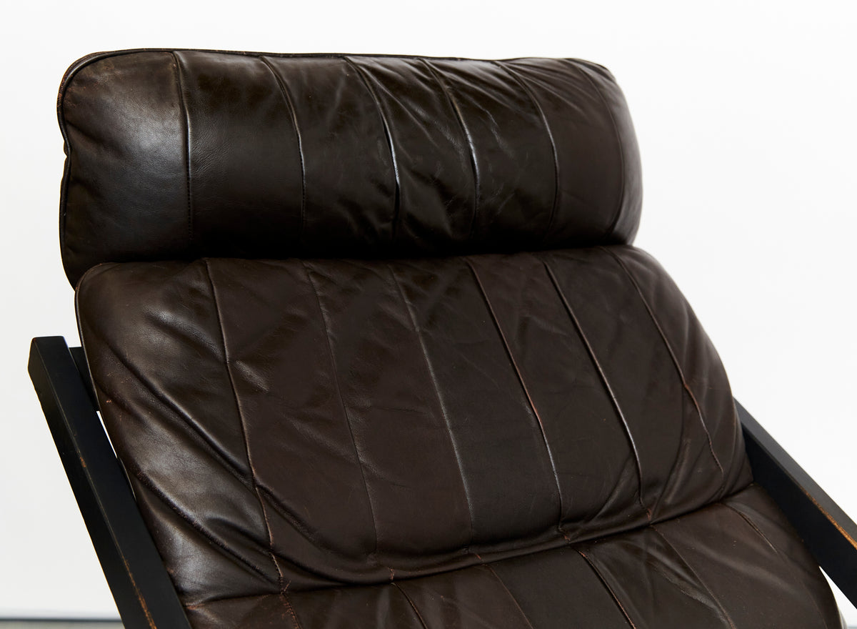 Close-up view of DS80 leather chair's quilted backrest detail