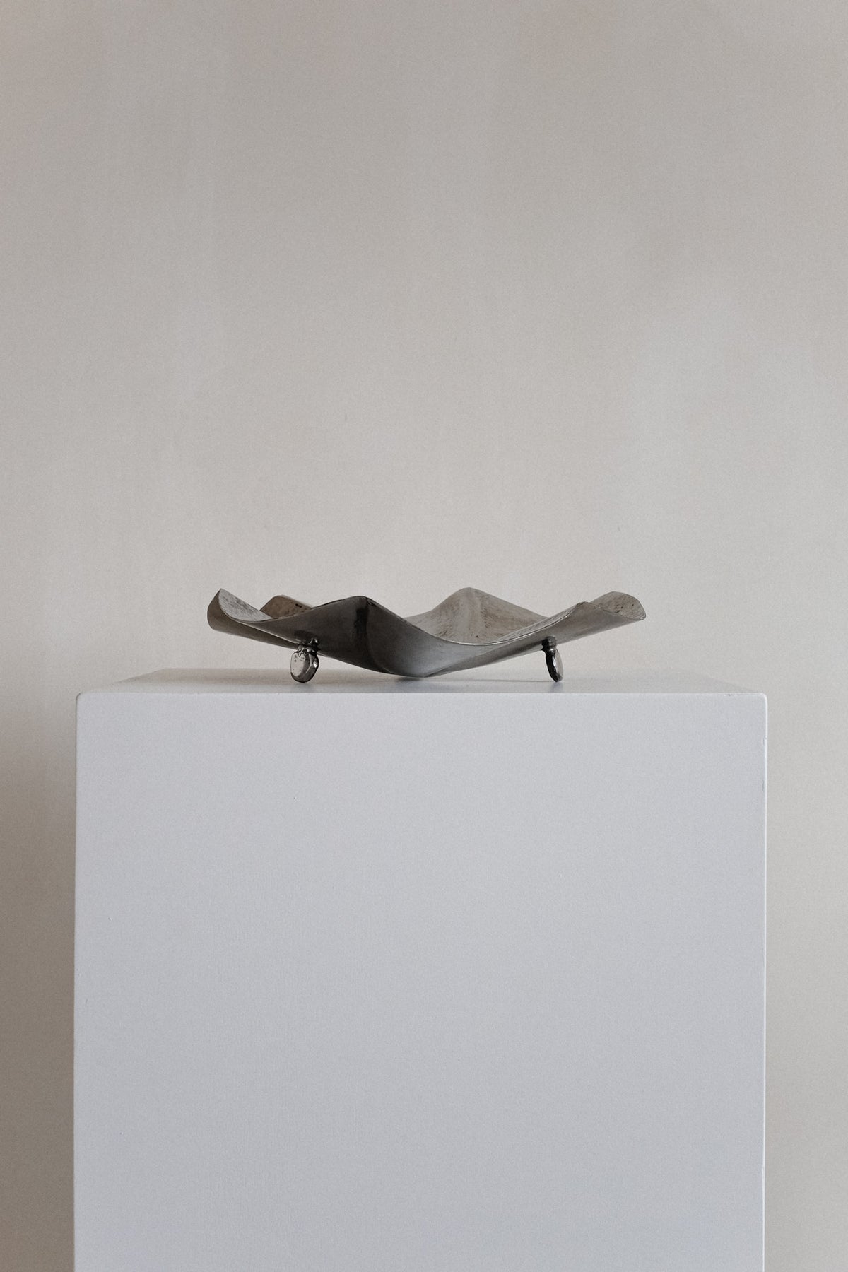 Decorative Footed Bowl — side angle on white pedestal