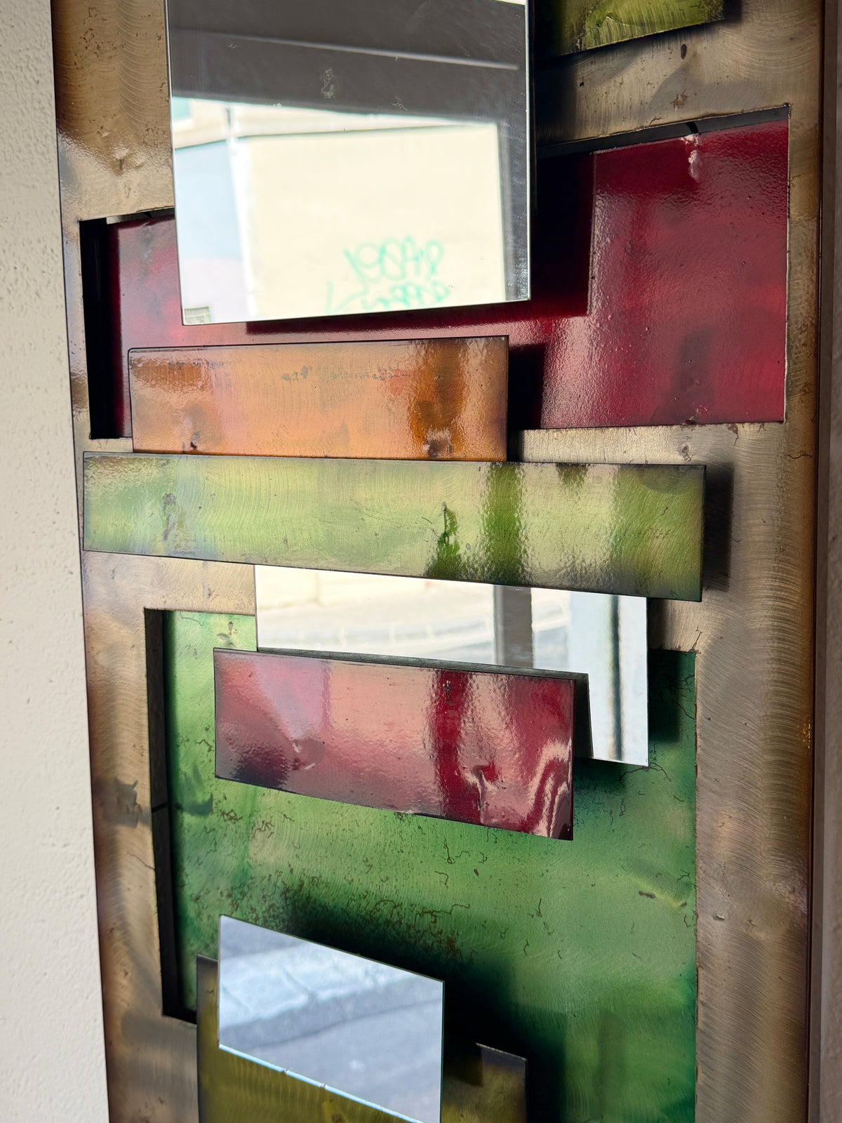 Large Polychrome Metal Mirror — 1970s — side angle