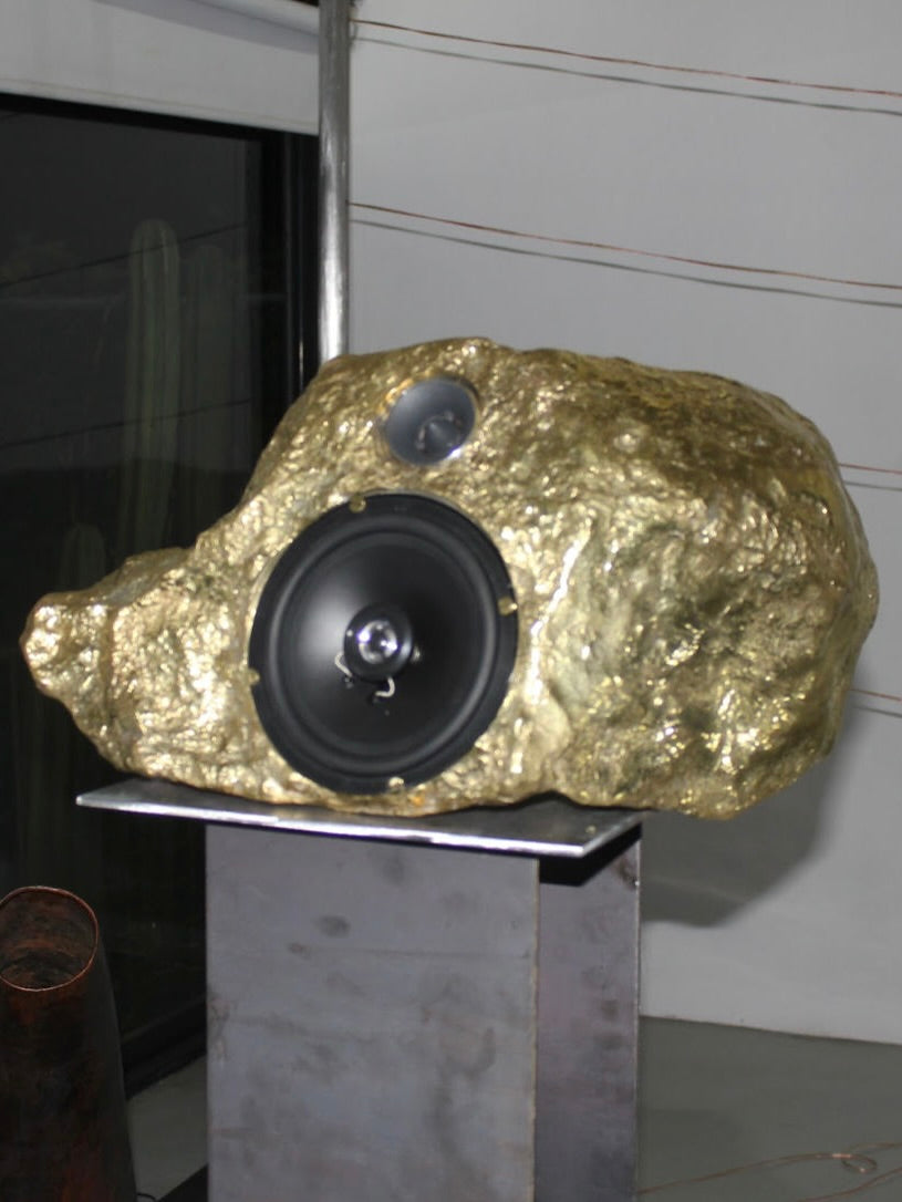 Bronze Singing-Stone MDL. C. Speaker — side angle showing textured bronze finish