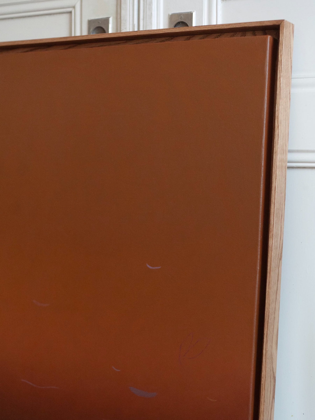 Warm Still, 2026 Painting — top view of brown canvas with wooden frame