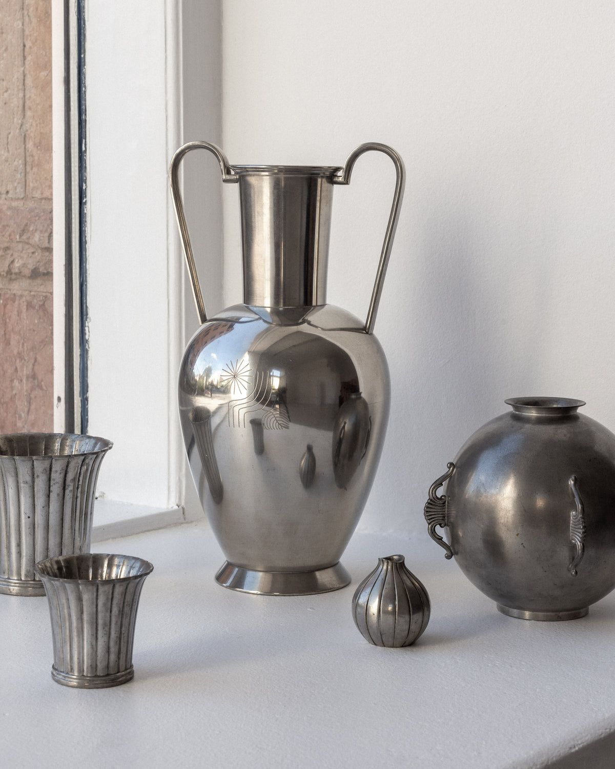 Large modernist pewter amphora vase with twin handles, 1930s