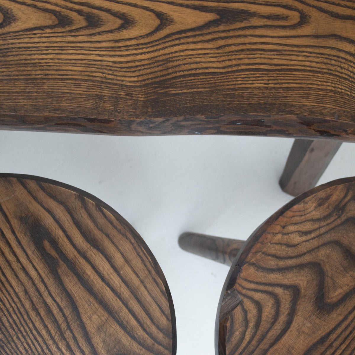 Mid Century Bench and Stools in wood — in context