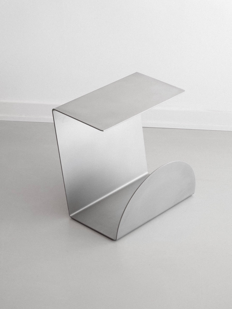 Side Table - 1.0 - Stainless Steel — back view showing minimalist design