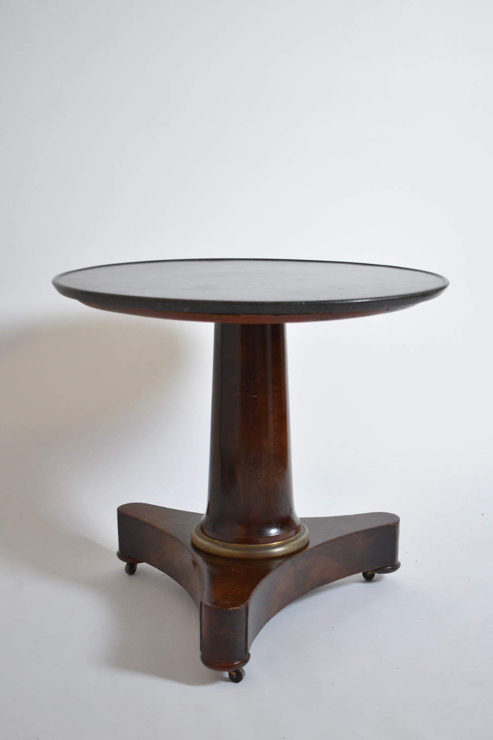 Mahogany Pedestal Table, XIXth c. — angled view highlighting circular top and base