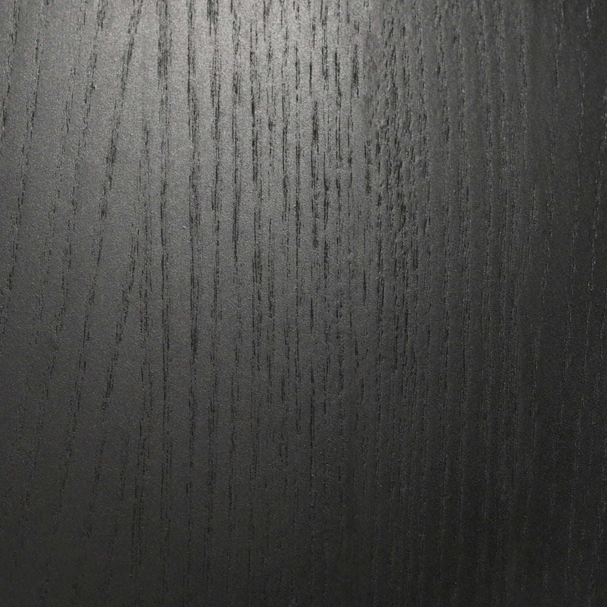 Edda Credenza — close-up of black wood grain surface