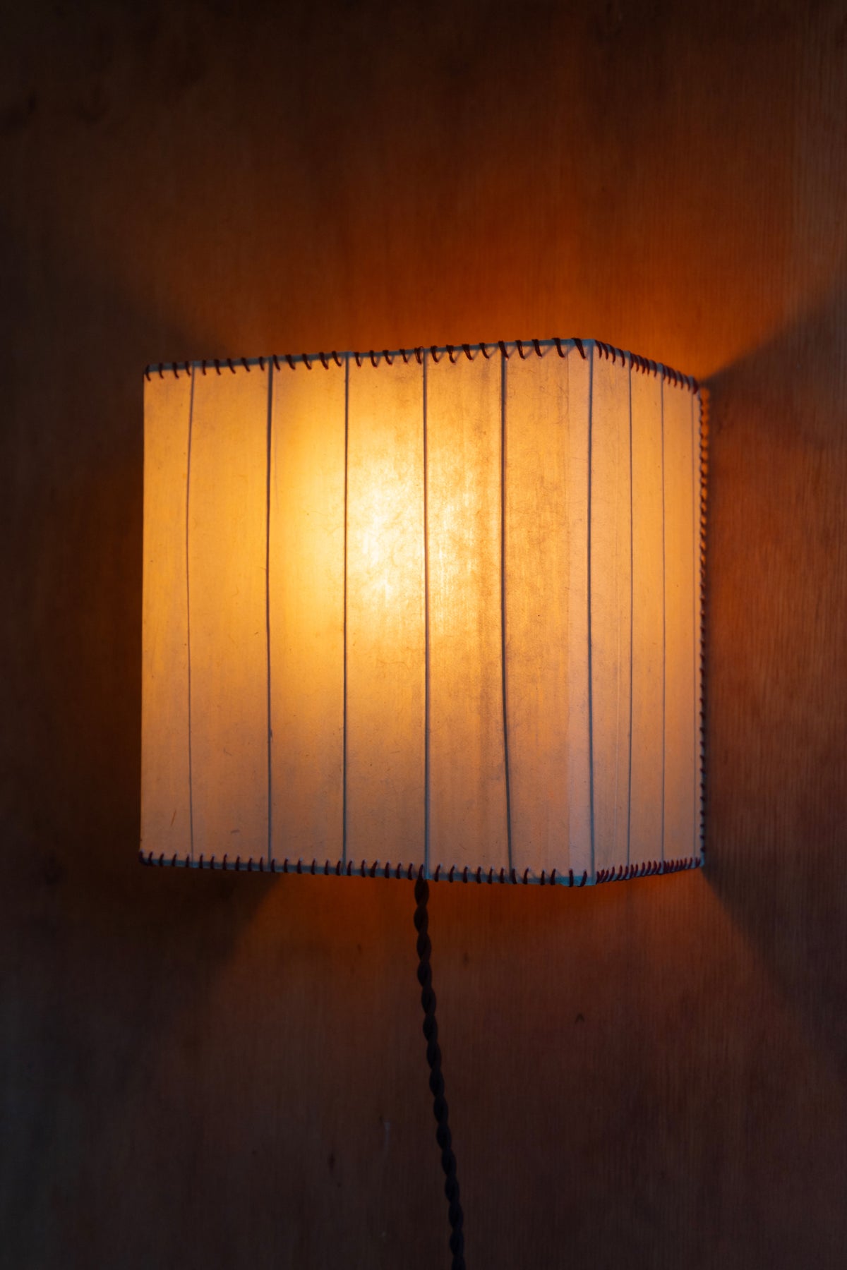Magdalena Sconce — close-up of warm light through textured shade