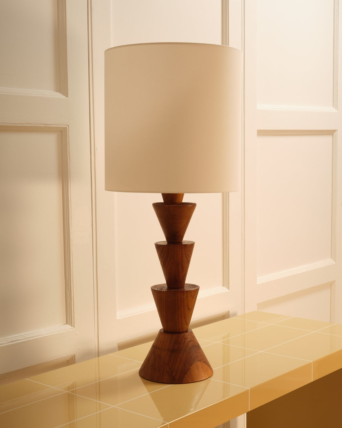 Geometric wooden table lamp base with stacked cone forms