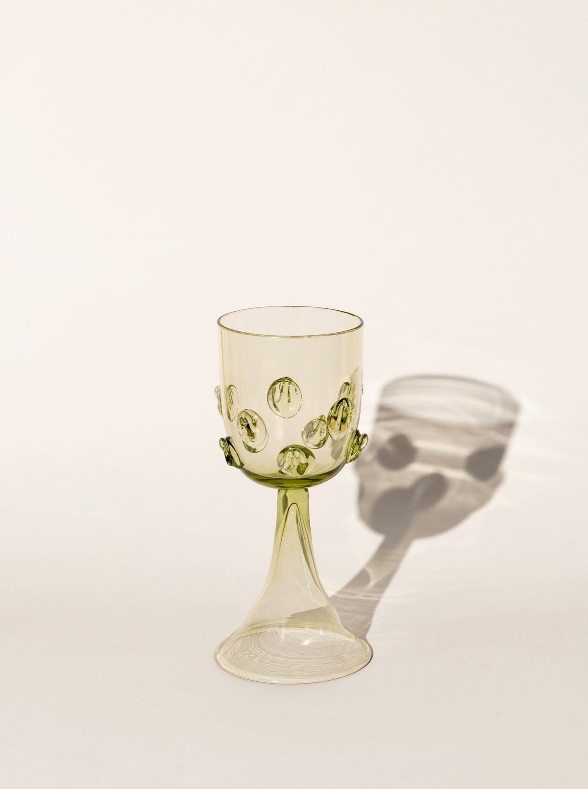 Pair of Mouthblown Wine Goblets - Dots — angled view on neutral background