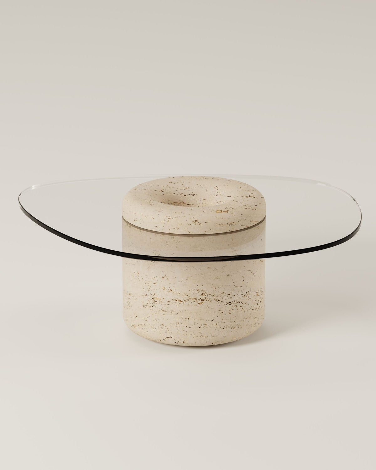 UUFO glass top coffee table with cylindrical travertine base by BURGIO