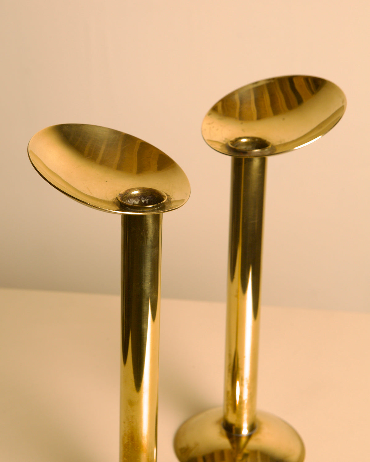 Pair of Large Danish Brass Candleholders 1960s — close-up of polished brass tops