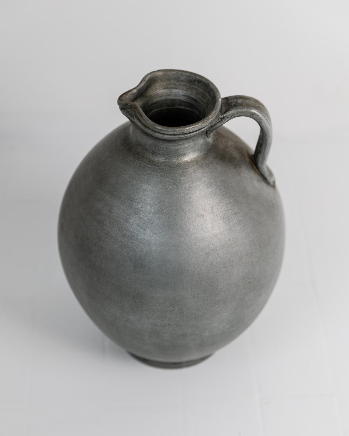Vintage 1960s Studio Ceramic Vase with Handle, Large Rounded Form with Silver Glaze, Timeless Design, handmade Pottery, Elegant Gift Idea — lifestyle setting