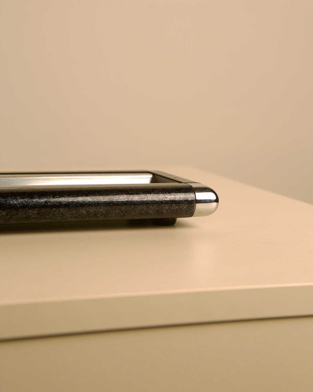 talian rectangular Bakelite and metal catch-all, 1970s — close-up