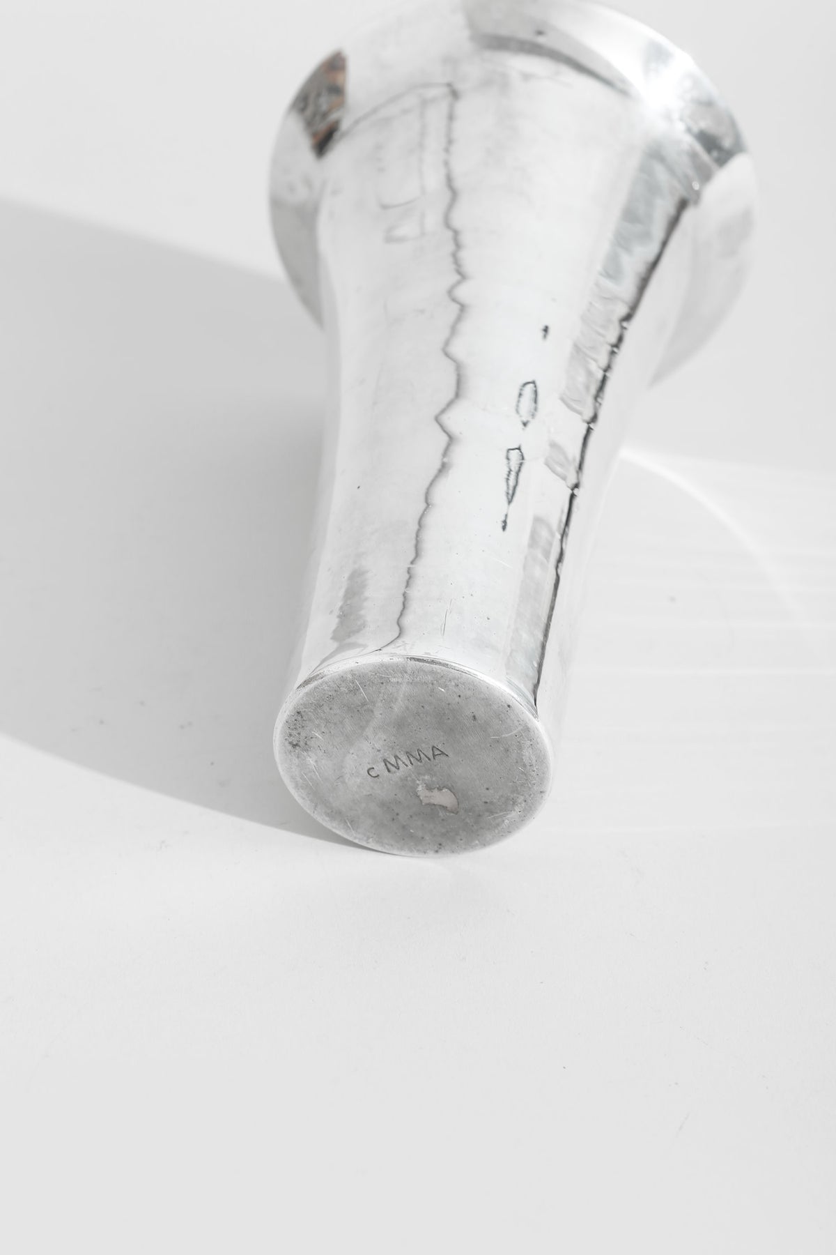 Bauhaus Chrome Vase — side angle showing reflective chrome surface
