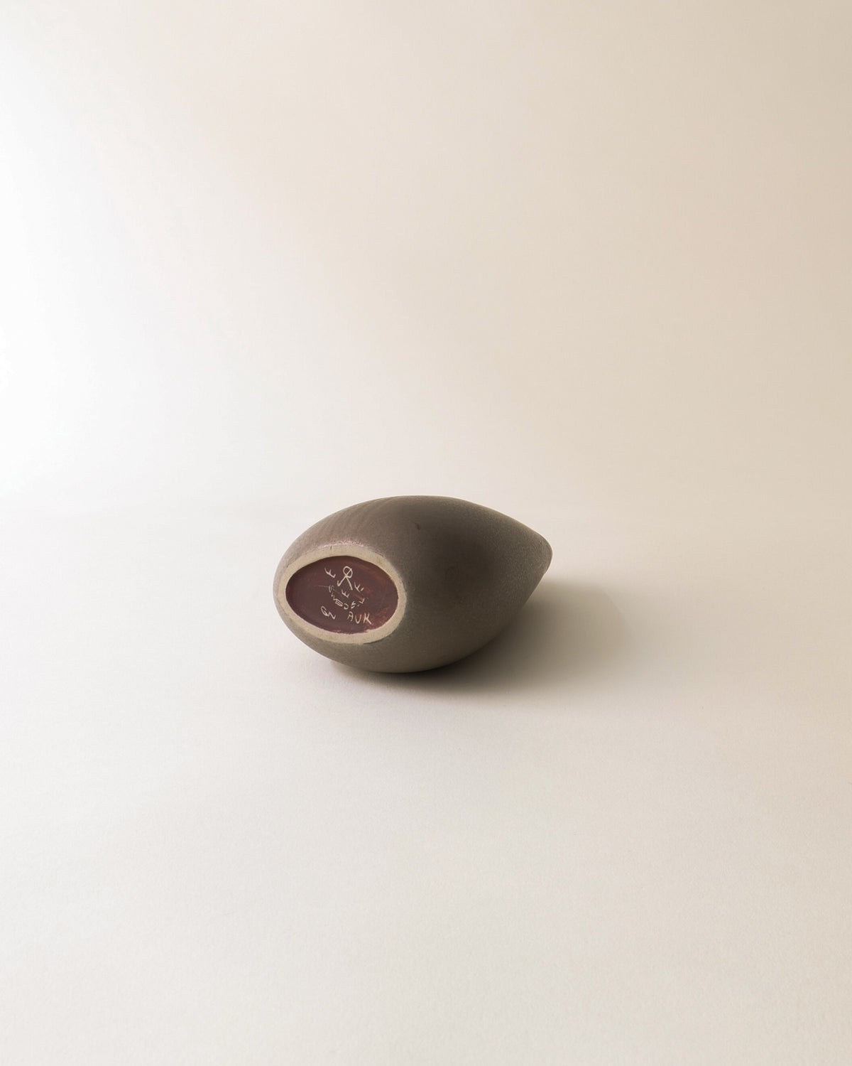 Ceramic vase base detail showing Gunnar Nylund signature mark