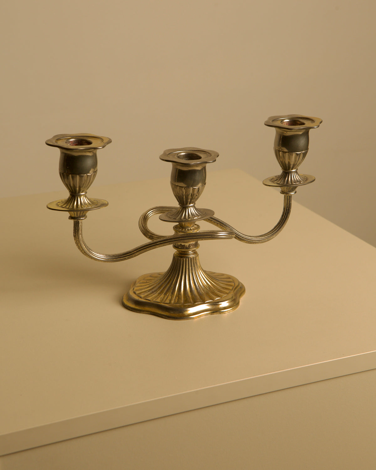 Italian "Medusa" Metal Candleholders, 1960s — side angle on neutral background
