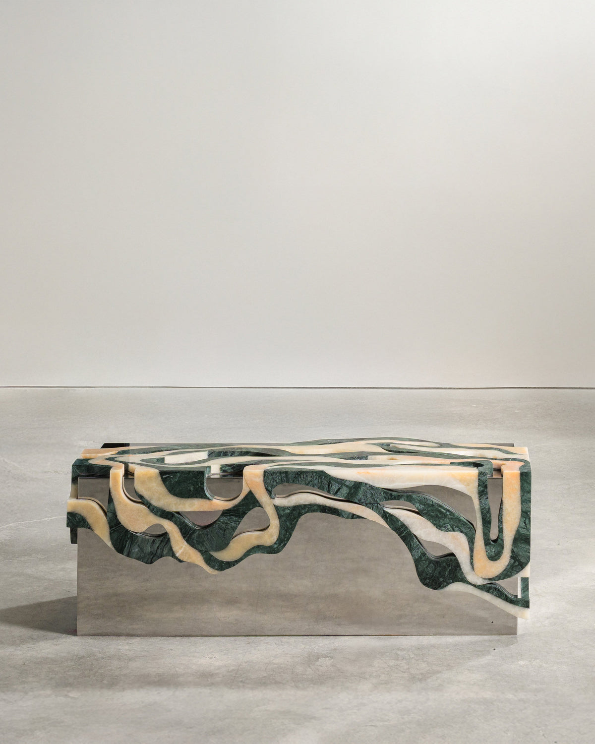 Orbis bench with green marble and beige resin flowing patterns