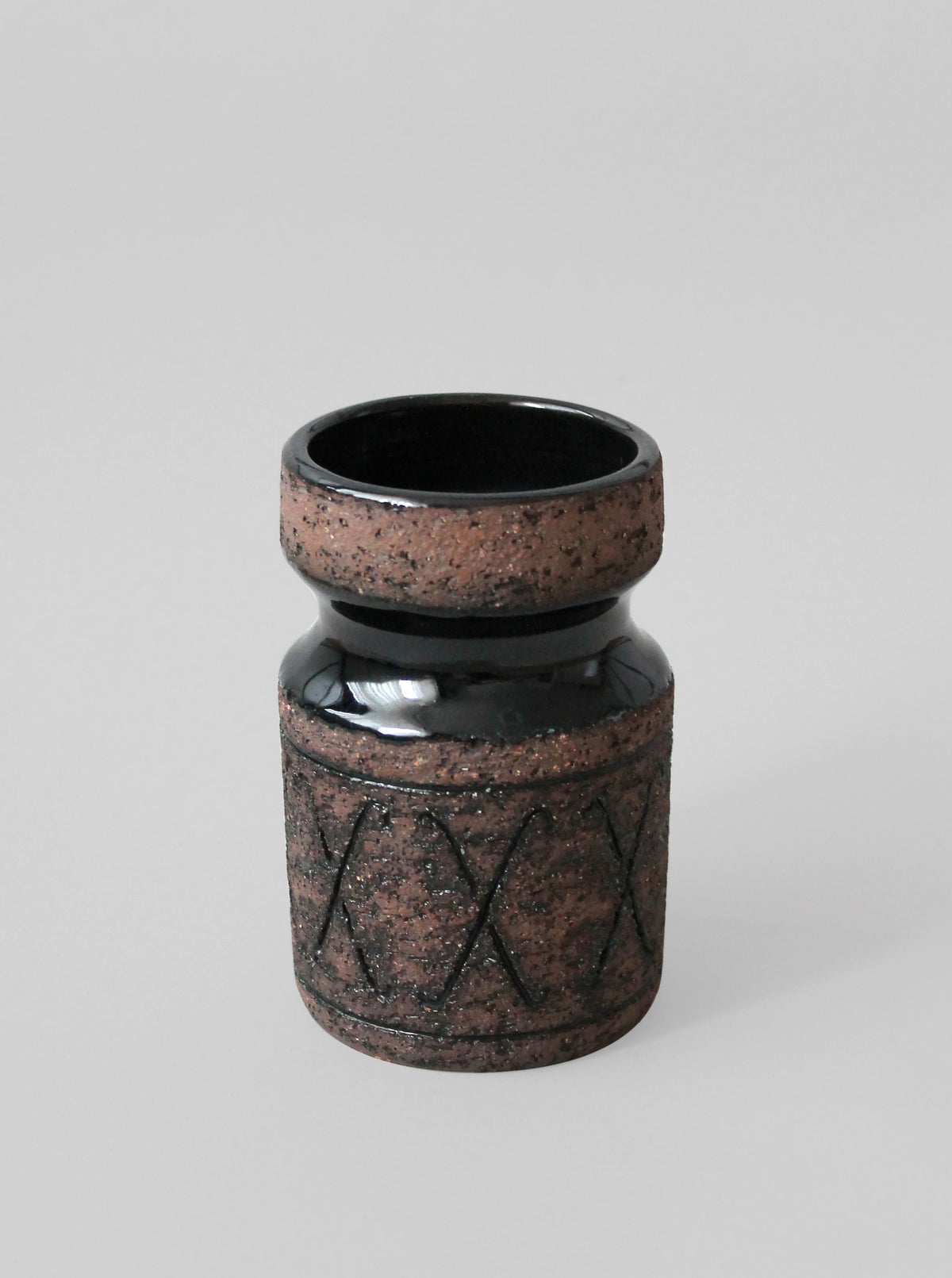 Gabriel Sweden ceramic vase with textured speckled finish and etched pattern