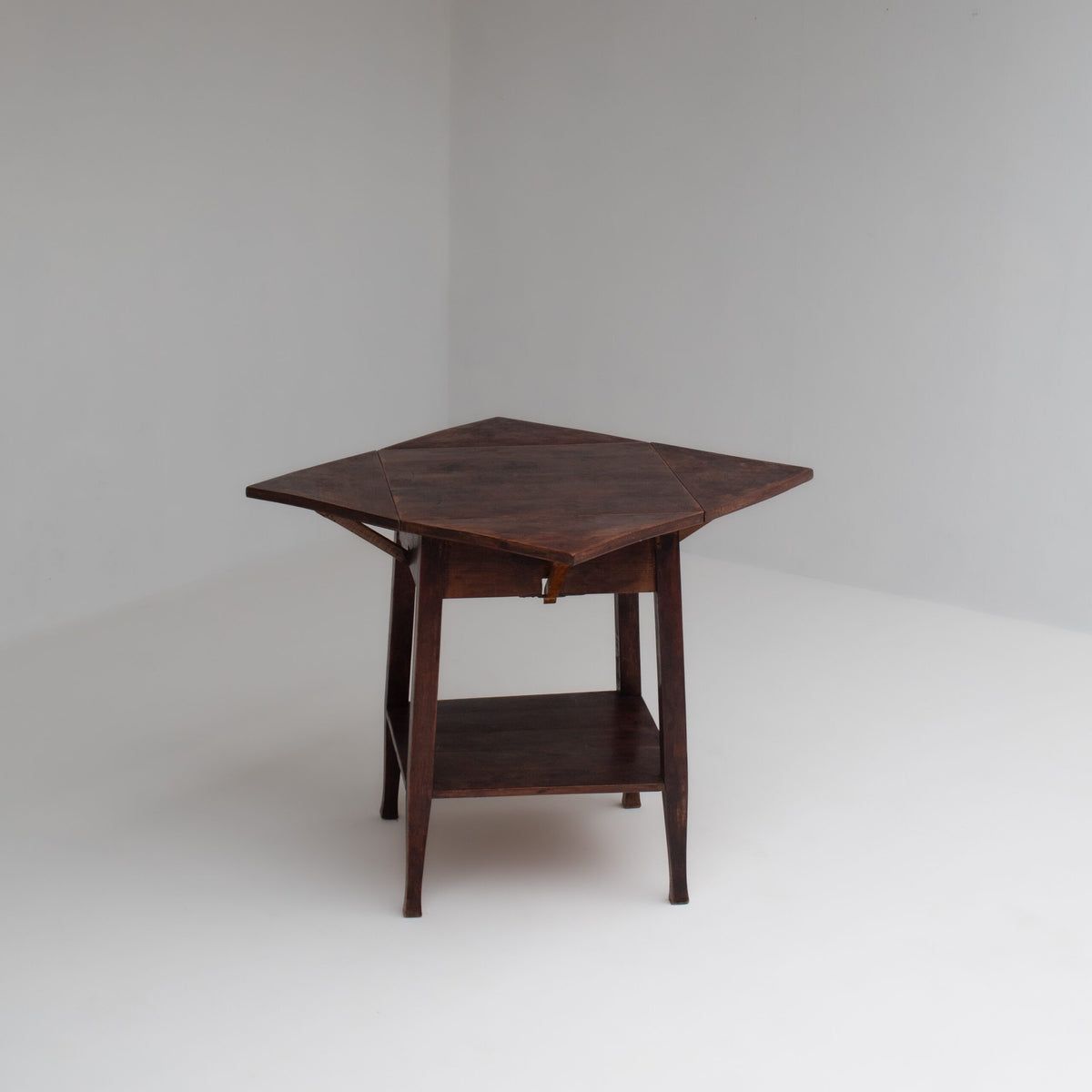 Art Deco Folding Side Table in Solid Wood — lifestyle setting