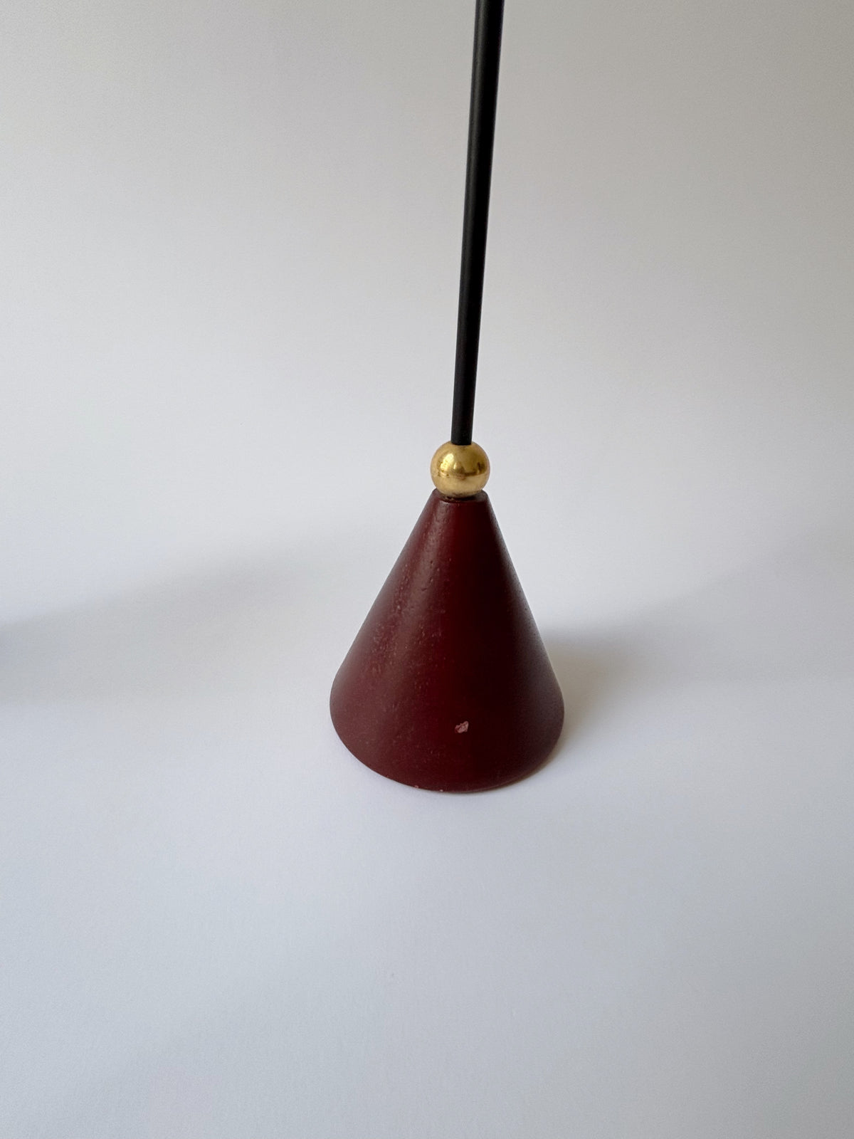Set of Postmodern Candle Holders in Wood and Metal — top view of red cone base