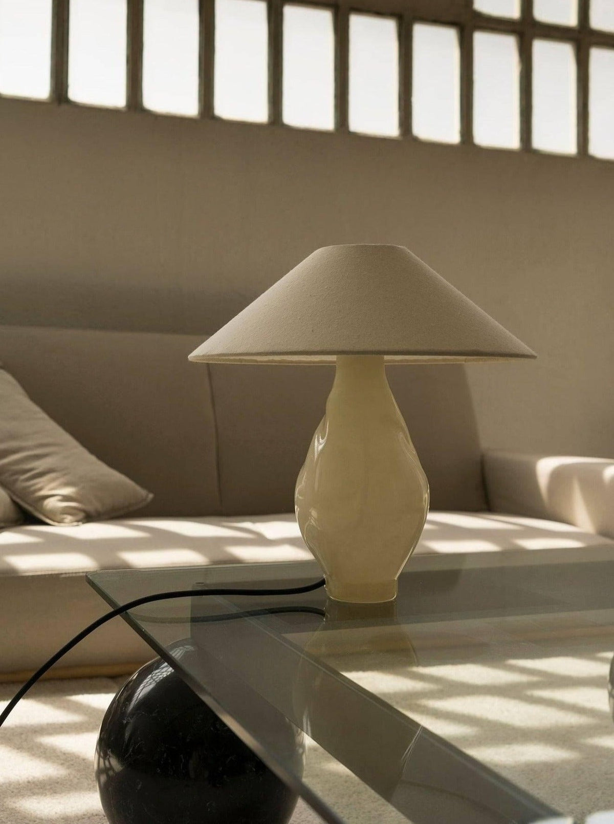 Beige conical glass table lamp lifestyle setting, Los Objetos Decorativos