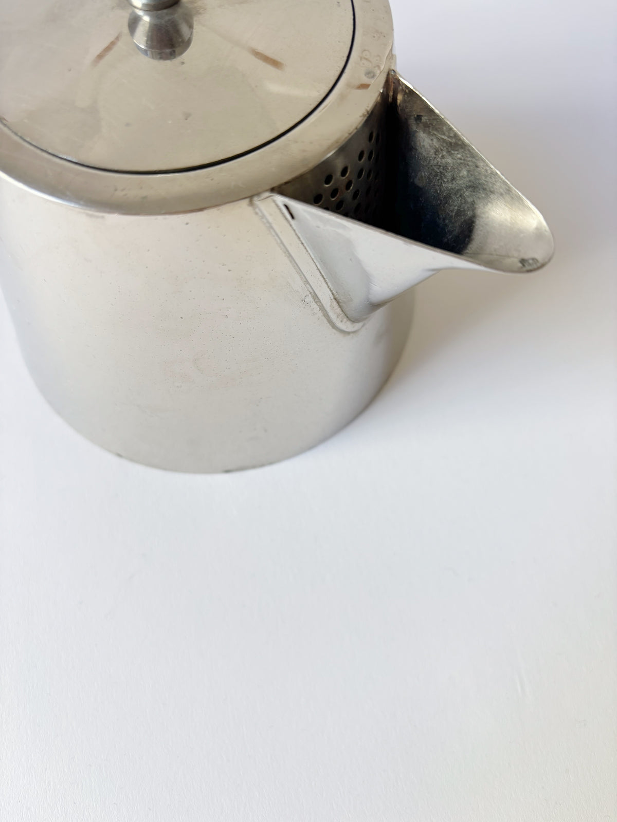 Art Deco Teapot, France — side angle showing polished metal finish