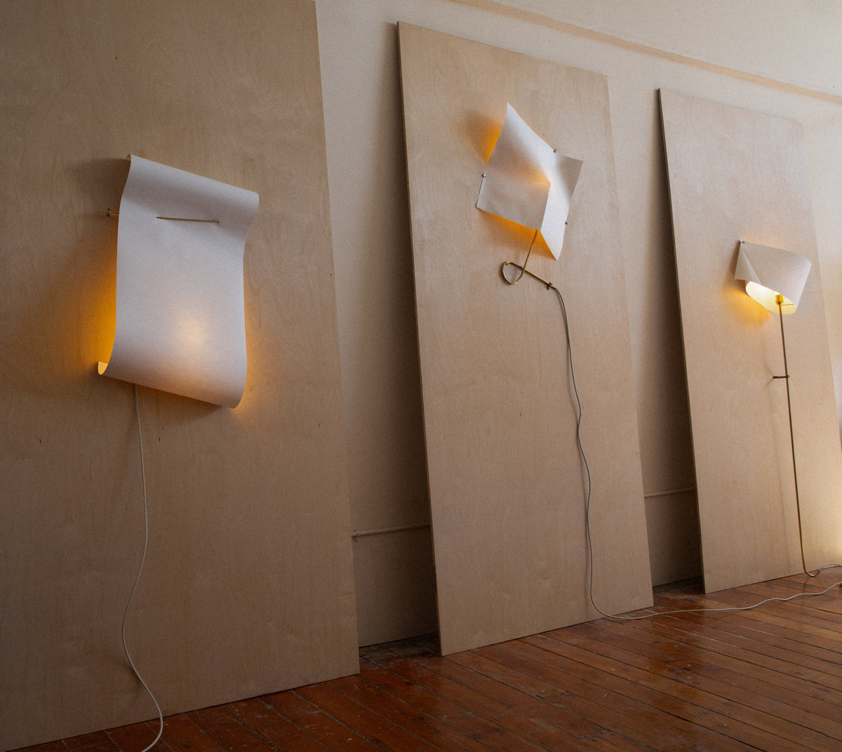 Wall Light - Papēr III — angled view on wooden wall panels