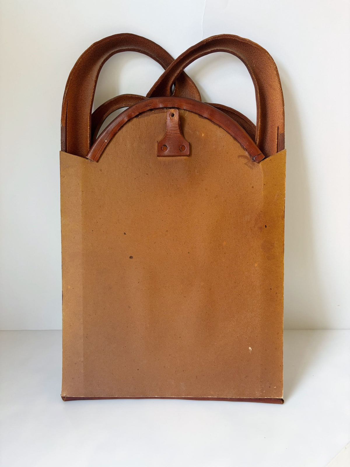 Back view of Polish artist mirror showing leather knot frame detail