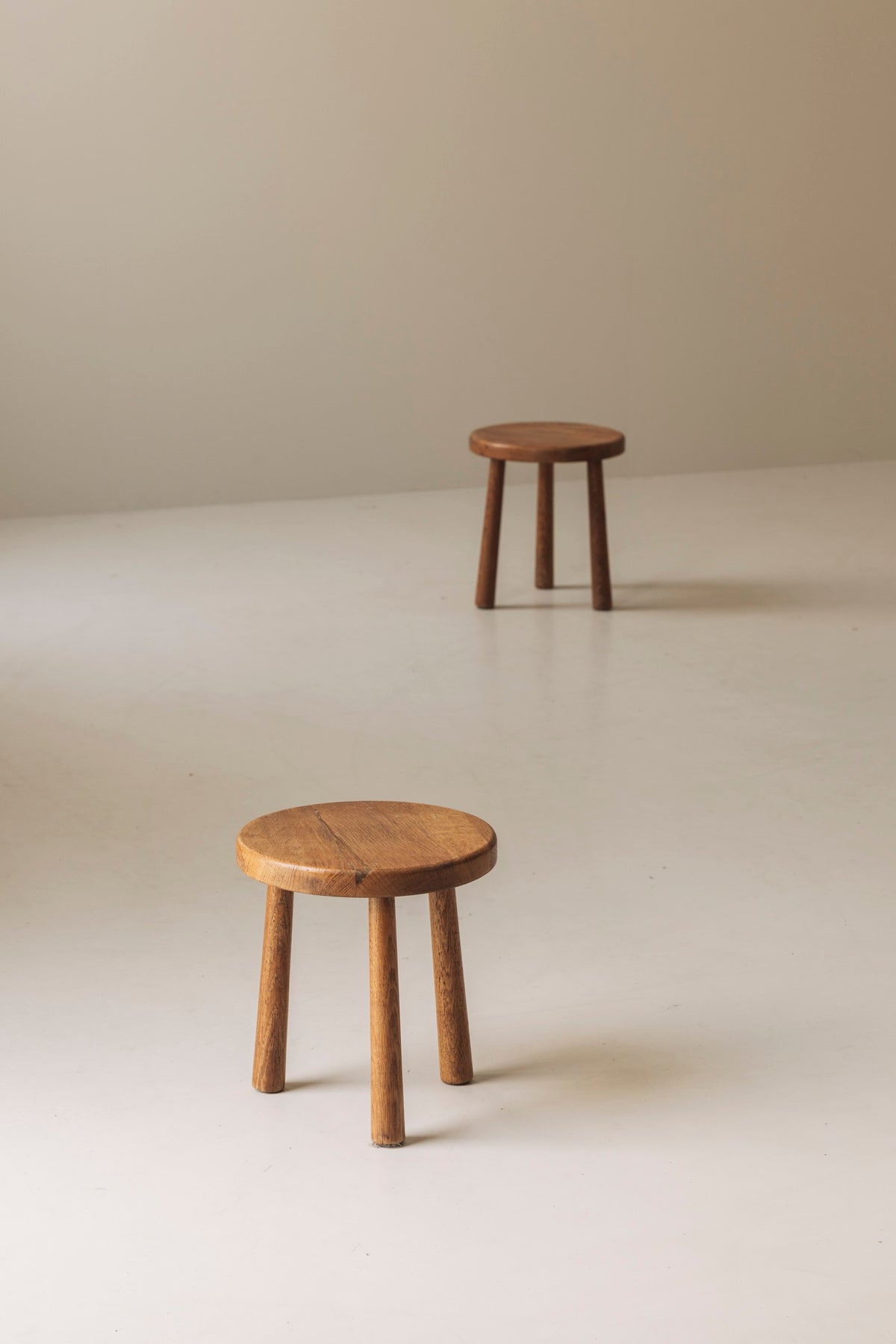 Sculptural Set of Two Solid Oak Stools, France, 1960s — lifestyle setting