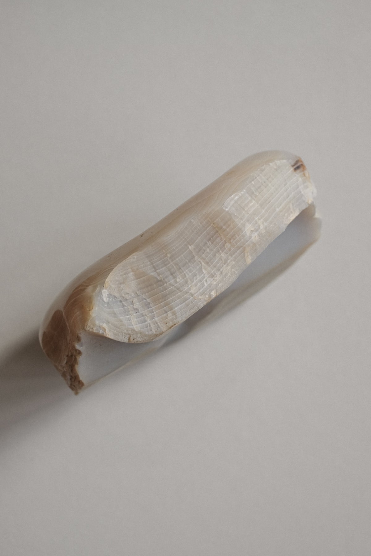 Translucent agate bowl detail showing natural striations and mineral patterns