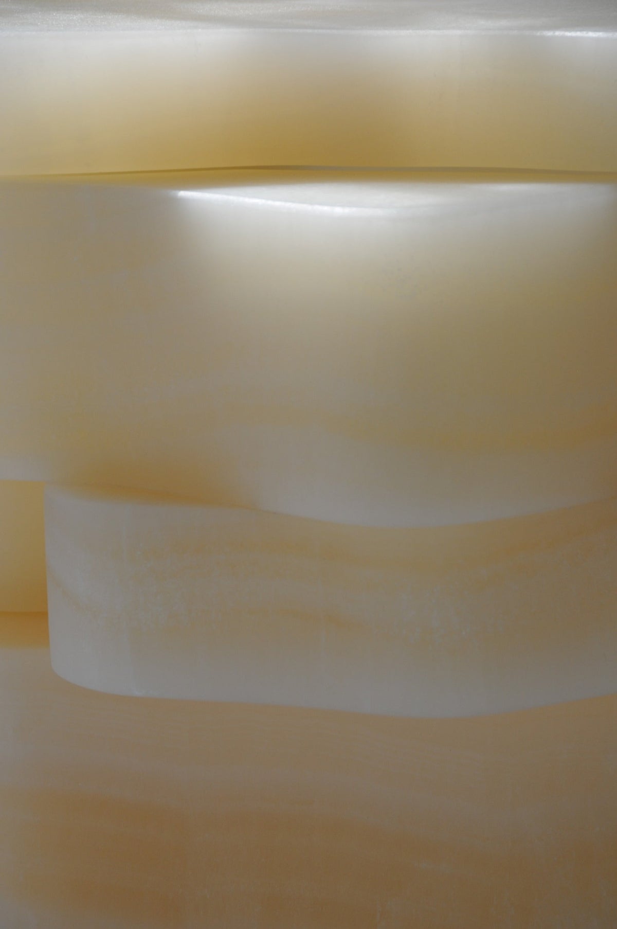 White Moth Nightstand / Side Table in White Onyx Marble — lifestyle setting