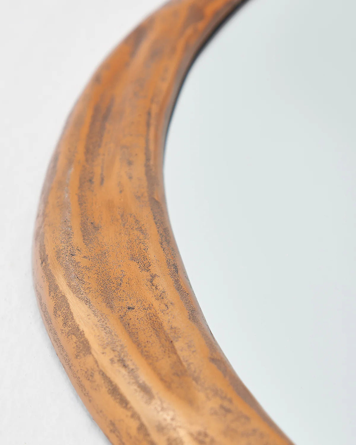 Rizzo Mirror — side angle of textured brass frame