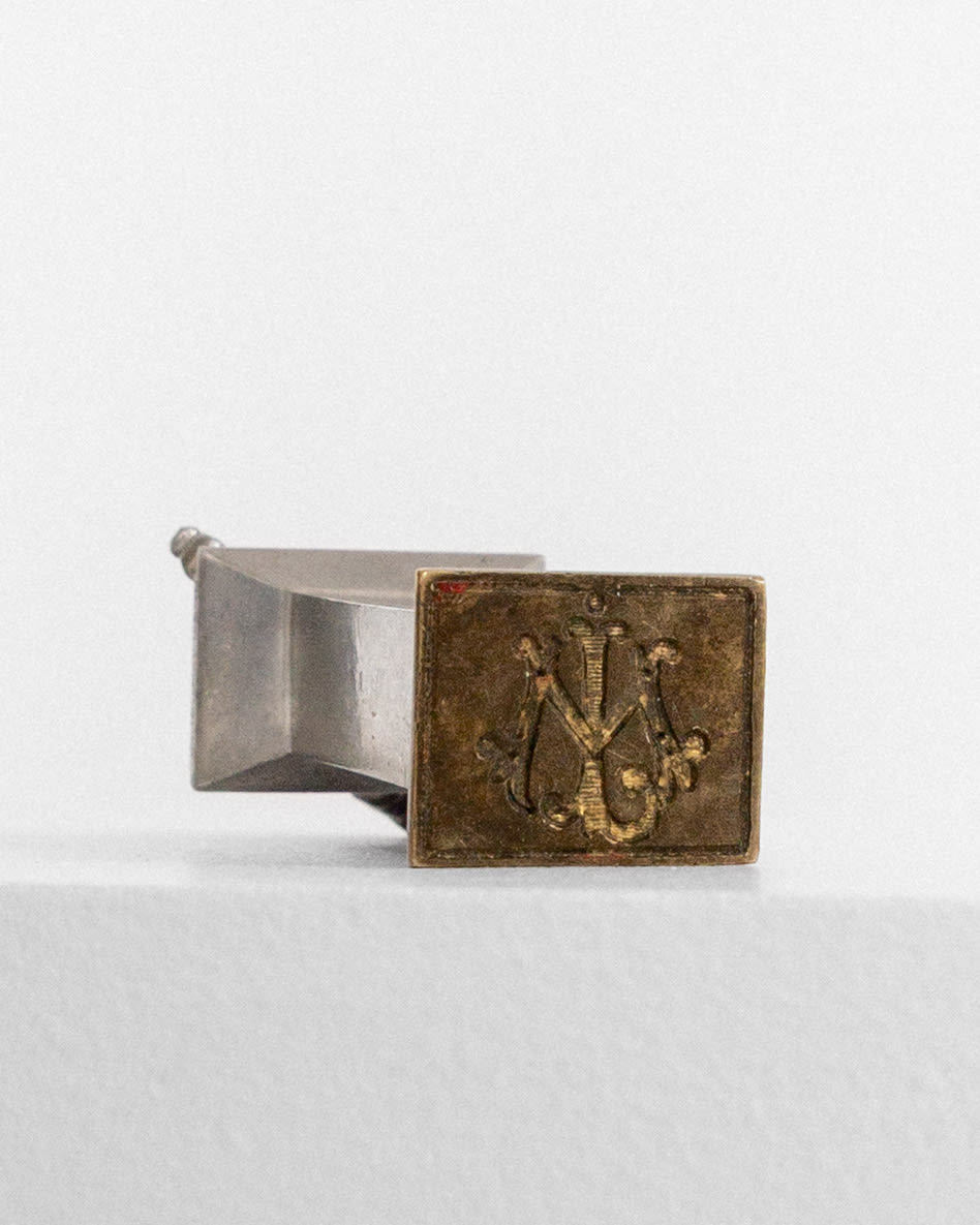 Art Deco pewter seal stamp with ornate monogram detail, 1930s