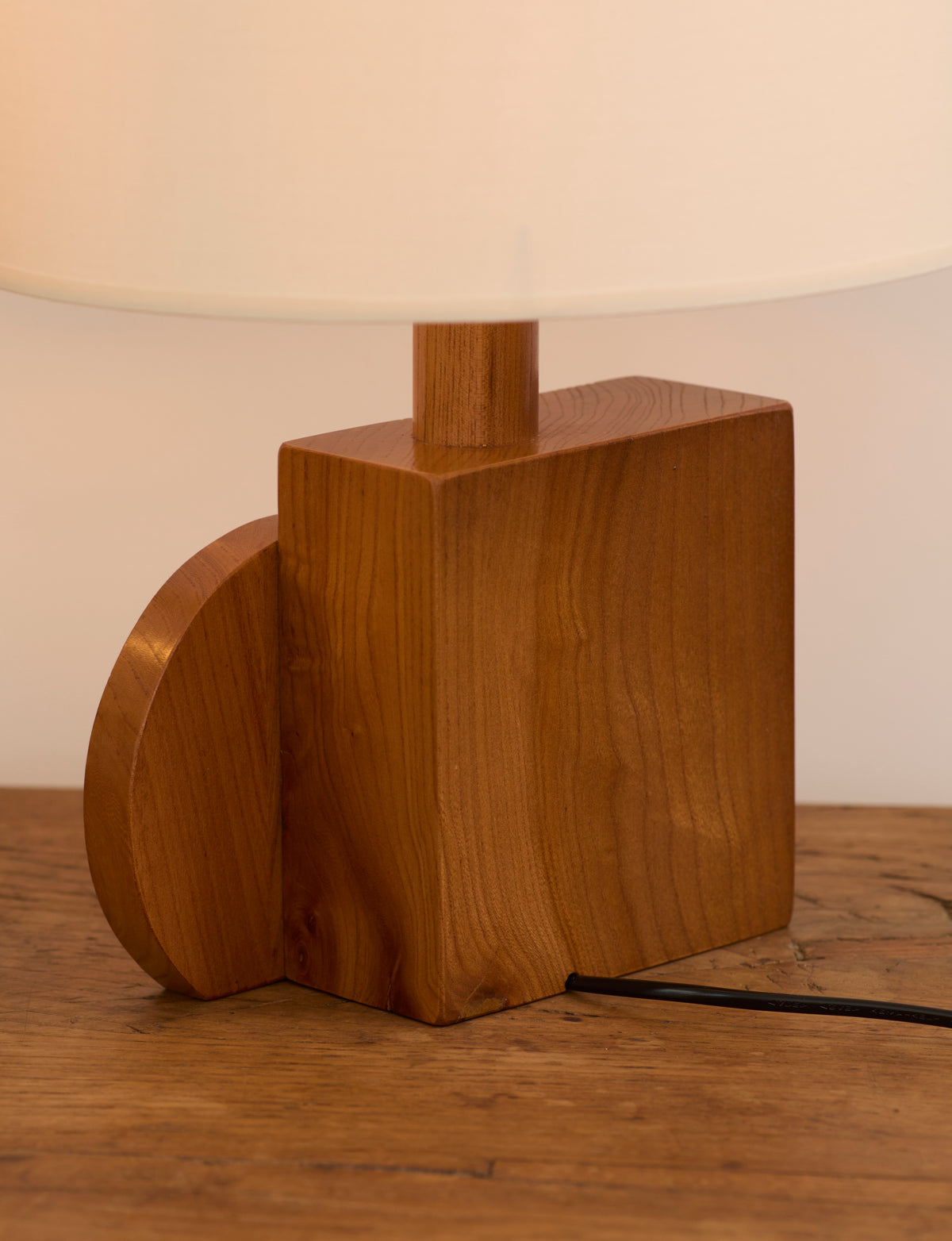 Set of 2 Vintage Artisanal Table Lamps In Solid Wood From France c. 1970 — close-up of wooden base with round detail