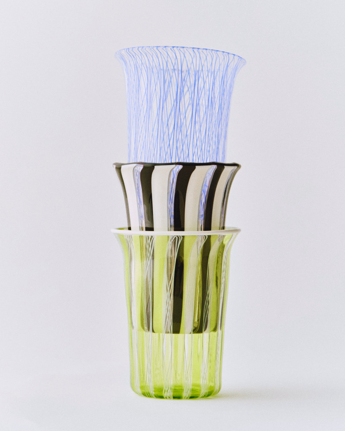Clara Glasses - Set of four — top view of colorful glass designs