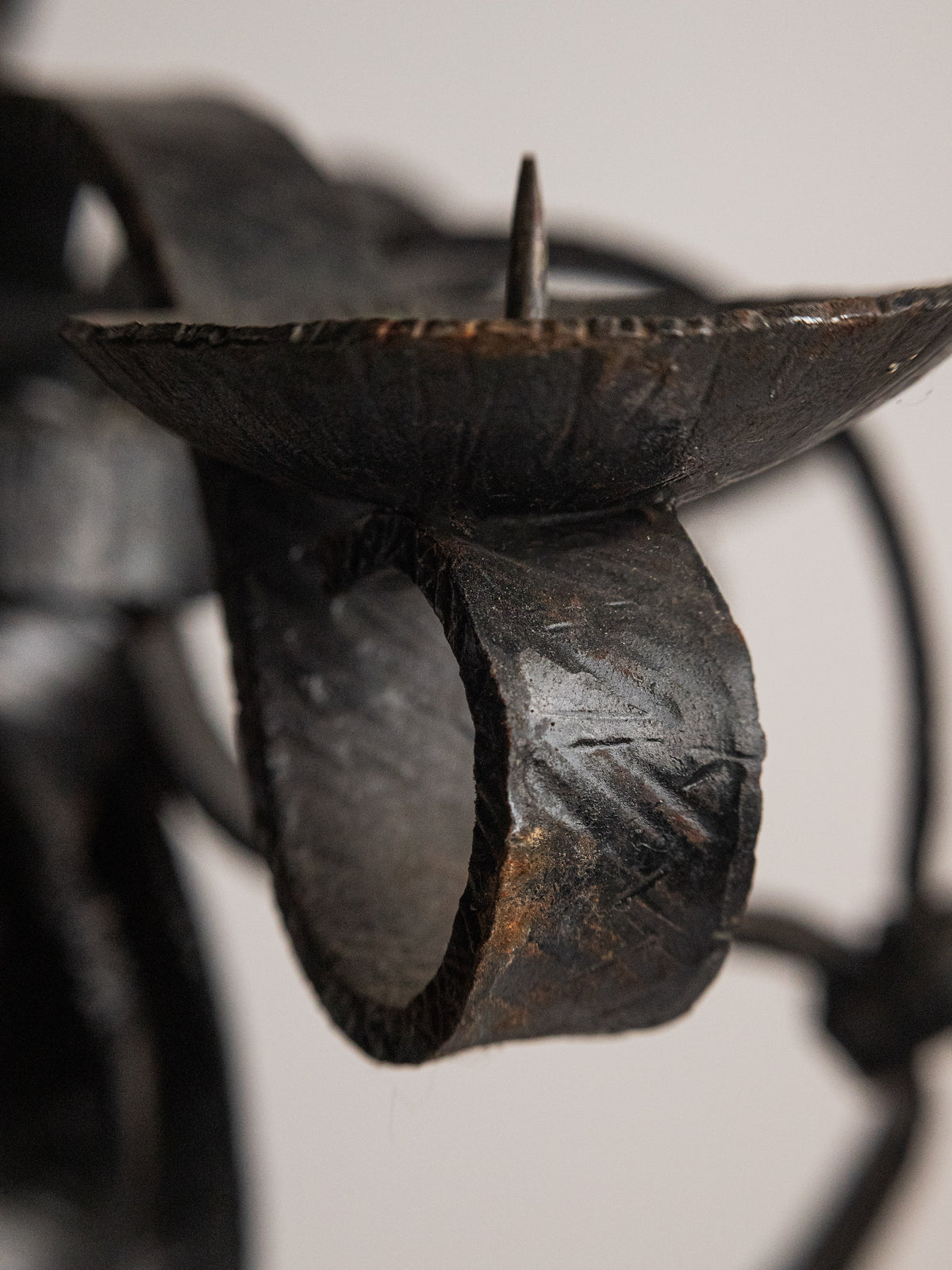 Vintage Folk Art Hand-Forged Wrought Iron Candelabra — close-up of textured iron detail